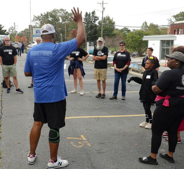 Kevin Montgomery addresses early Helene volunteers at our office