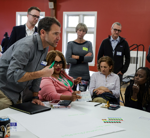 Dan Leroy with participants in an early meeting that formed the Buncombe County Long-Term Recovery Group
