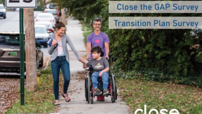 child and family navigating sidewalks with wheelchair