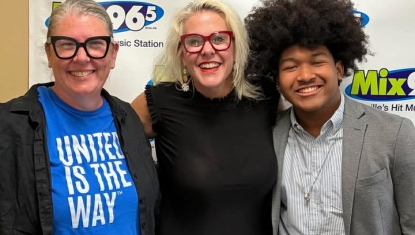 Elisabeth (United Way), Melanie (Asheville Area Focus), and Nyles (rising senior and intern at Slay the Mic)